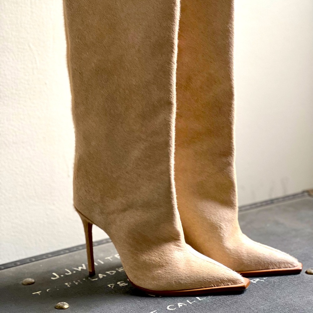 7.5 W Shutz, knee high, white faux fur boots.